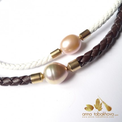 different pink pearl clasps for comparison of size and color 