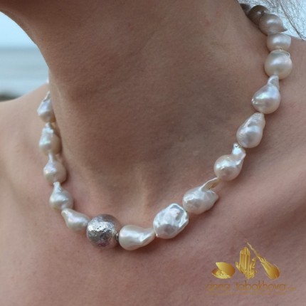 Flameball white pearl interchangeable necklace with a hammered silver clasp (sold separatly) .